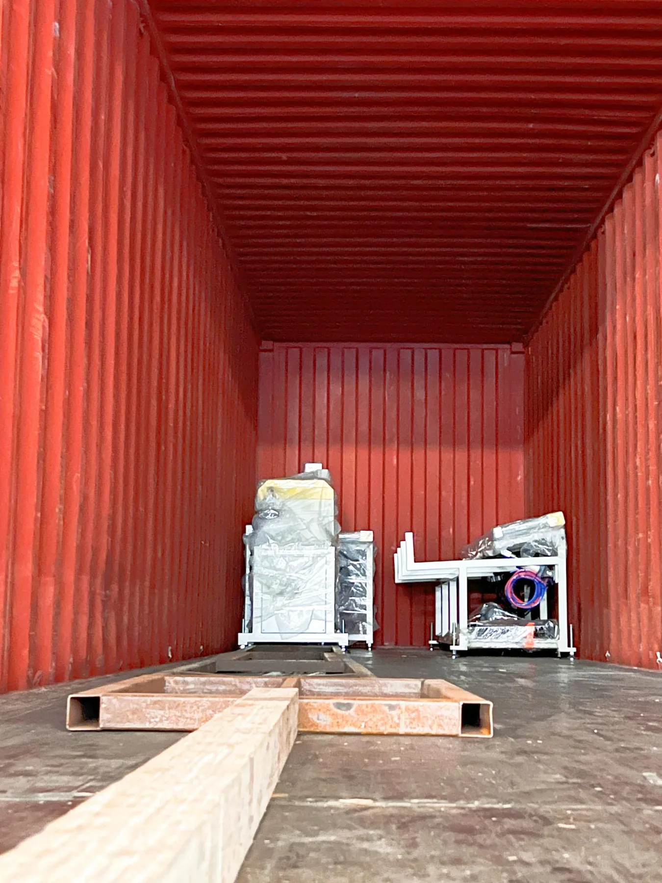 Protected machinery positioned inside the shipping container