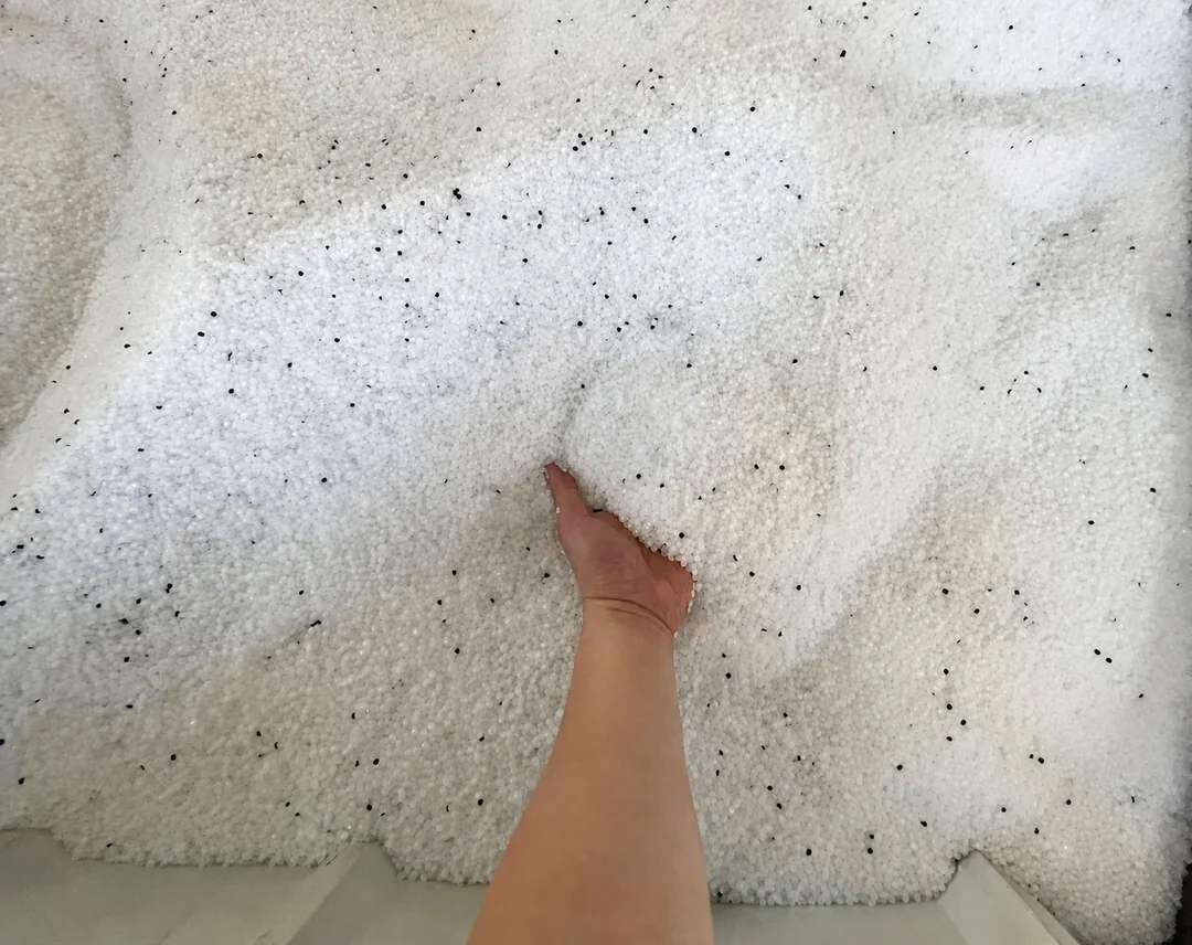 White PE compounded resin pellets with dispersed carbon black